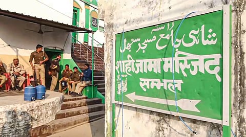 Police and security personnel keep a vigil near the premises of Shahi Jama Masjid ahead of Friday prayers in Sambhal, Friday, Nov. 29, 2024.