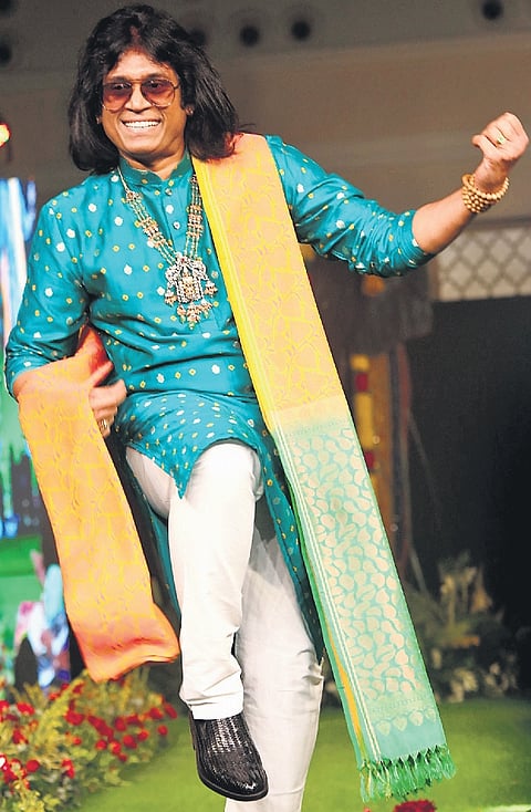 Pictures of musicians walking the ramp in the first edition of Marvellous Maghazhi