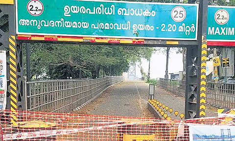 The barricade at the western entrance to Thoppumpady Harbour Bridge