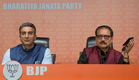 Delhi BJP President Virendra Sachdeva and BJP national spokesperson Gaurav Bhatia address a press conference at party headquarters, in New Delhi, Saturday, Nov. 30, 2024.