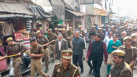 A three-member judicial commission comprising retired Allahabad High Court judge Devendra Kumar Arora, retired IAS officer Amit Mohan Prasad and retired IPS officer Arvind Kumar Jain visits the Shahi Jama Masjid, in Sambhal, Uttar Pradesh, Sunday, Dec. 1, 2024