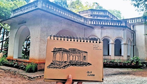 A pen and ink sketch of the front of the bungalow by artist Prasanna