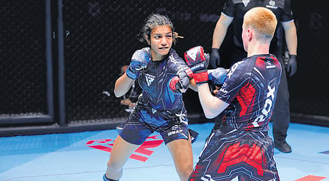 Afshan Fathima during a MMA Championship