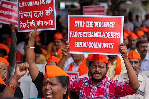 Members of Hindu Aikya Vedika or Hindu United Front shout slogans condemning the recent arrest of prominent Hindu leader Krishna Das Prabhu and the alleged attacks on Hindus in Bangladesh during a protest in Hyderabad
