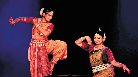 Odissi dancer Madhulita Mohapatra (left), performing with a member of her Nrityantar dance troupe at the Changampuzha Fest held at Changampuzha Park on Sunday