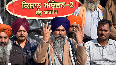 Farmer leader Sarwan Singh Pandher (C), with others, addresses the media at the Shambhu border in Patiala district, Monday, Dec. 9, 2024.