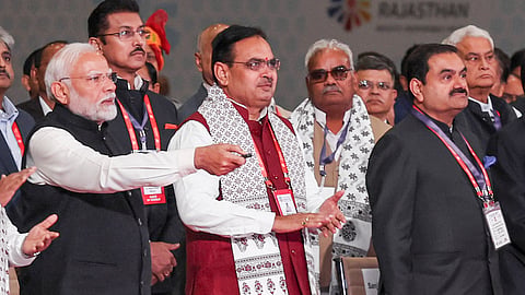 Prime Minister Narendra Modi with Rajasthan Chief Minister Bhajanlal Sharma and Adani Group Chairperson Gautam Adani during the inauguration of Rising Rajasthan Global Investment Summit, in Jaipur, Monday, Dec. 9, 2024.