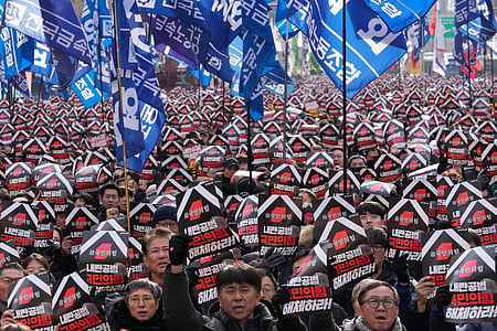 Protesters stage a rally to demand South Korean President Yoon Suk Yeol's impeachment in Seoul, South Korea, Thursday, Dec. 12, 2024.