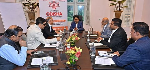 Electronics and IT Minister Mukesh Mahaling and officials discussing with investors in Bengaluru on Friday.
