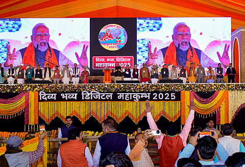Prime Minister Narendra Modi addresses a public meeting during the inauguration of various development projects for the 2025 Maha Kumbh mela, in Prayagraj, Friday, Dec. 13, 2024.