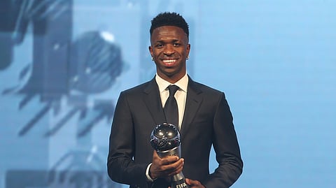 Vinicius Junior of Real Madrid is awarded as the Best Men's FIFA Player during the FIFA Football Awards 2024 in Doha, Qatar, Tuesday, Dec. 17, 2024.