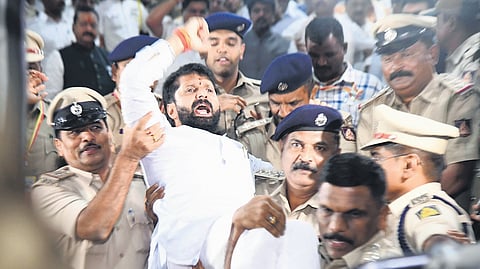 BJP MLC CT Ravi being taken away by the police in Belagavi on Thursday