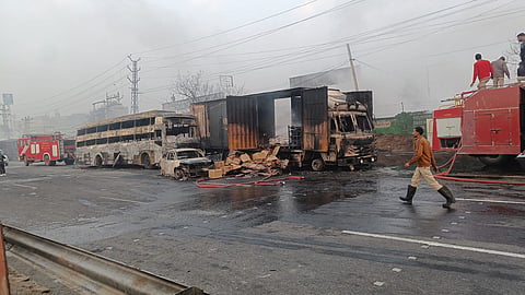 The site of a massive fire that broke out following a truck collision on the Jaipur-Ajmer national highway.