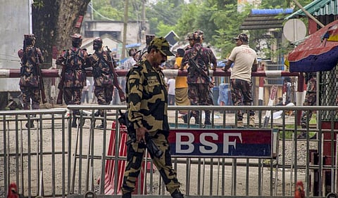 A Border Security Force guard is seen at the India-Bangladesh border checkpost at Hili in Dakshin Dinajpur district.