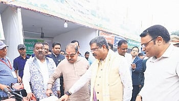 Pradhan checking out farm equipment at Krushi Mela in Sambalpur