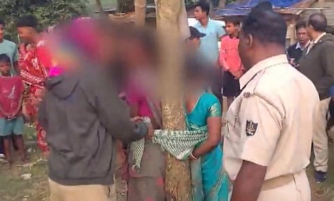 Balasore police at the scene where the two women were tied to a tree and assaulted for alleged conversion.