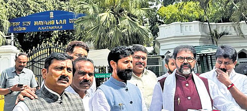 BJP MLC CT Ravi, LoP in Council Chalavadi Narayanswamy and other party leaders address the media after calling on the governor in Bengaluru on Monday