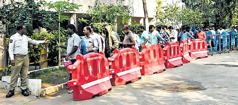 People apprehended for drunk driving on December 31 stand outside the Goshamahal Traffic Training Institute on Wednesday