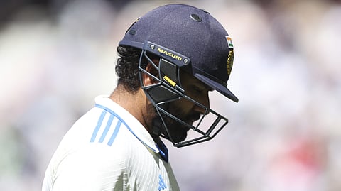 India's Rohit Sharma leaves the field after being dismissed on day five of the fourth cricket Test match between Australia and India at the Melbourne Cricket Ground (MCG) in Melbourne on December 30, 2024.