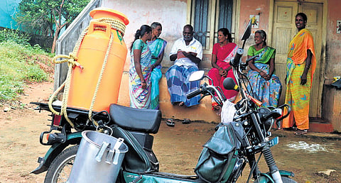 Govindaswamy with residents of Nayakaneeri village in Vellore