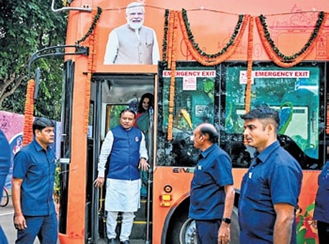 CM Majhi standing at the door of a double-decker bus after its launch
on Tuesday | DEBADATTA MALLICK