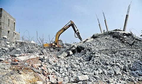 An illegal structure demolished by HYDRAA at Neknampur area in Manikonda of Rangareddy district on Friday