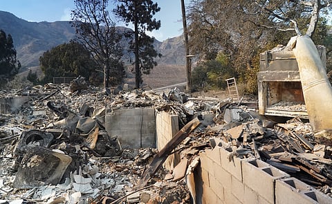 View of the ruins of Kyle Kucharski and Nicole Perri's house destroyed by the Palisades Fire in the Pacific Palisades neighborhood of Los Angeles, California on January 10, 2025.