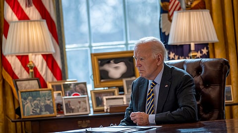 US President Joe Biden listens during a briefing in the Oval Office at the White House in Washington, Friday, Jan. 10, 2025.