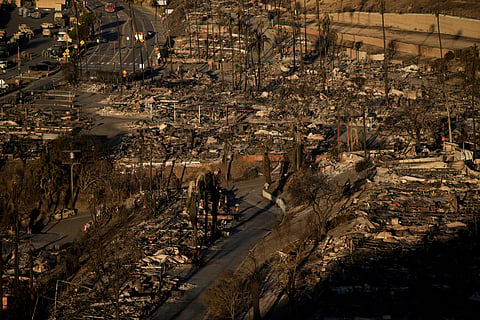 The Palisades Fire leaves total devastation in the Pacific Palisades neighborhood of Los Angeles, Monday, Jan. 13, 2025.