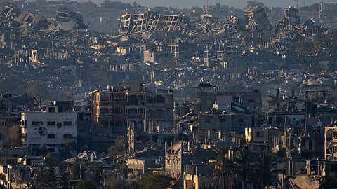 Destroyed buildings are seen inside the Gaza Strip from southern Israel, Monday, Jan. 13, 2025.
