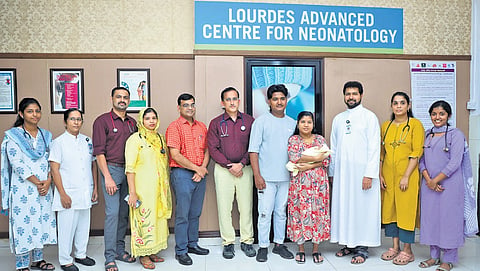 Nova’s parents with the medical team responsible for her recovery
