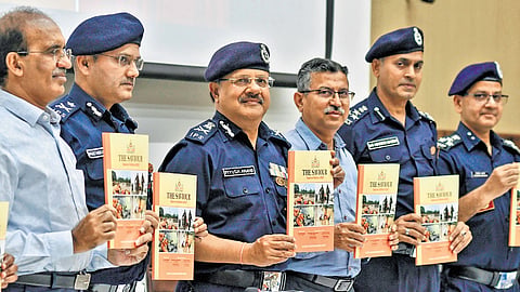 NDRF Director General Piyush Anand releases a special edition of the annual newsletter ‘The Saviour’ at Kondapavuluru on Saturday