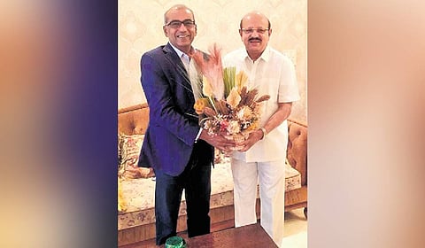 A file photo of Chandra Arya with
his relative and former minister
TB Jayachandra in Bengaluru.