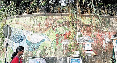 The murals painted in various parts of the city as part of the Arteria project are in disrepair without proper maintenance. A Scene in front of Museum.