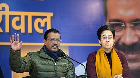 Aam Aadmi Party National Convener Arvind Kejriwal and Delhi CM Atishi at a press conference, in New Delhi on Wednesday.
