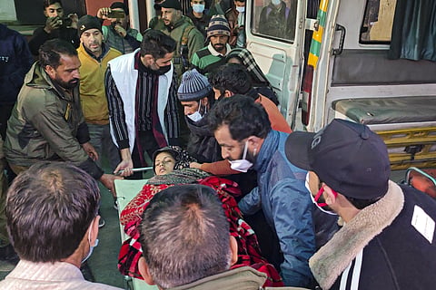 A patient from the Badhaal village being taken to a hospital amid the deaths of at least 17 people belonging to three families, under suspicious circumstances, in Jammu and Kashmir's Rajouri district, Wednesday, Jan. 22, 2025.