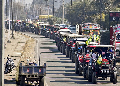Farmers participate in tractor march in Amritsar, Punjab.