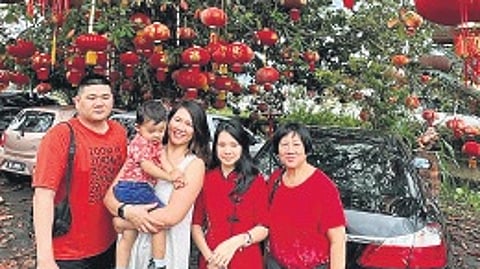 Joonie Tan with her family