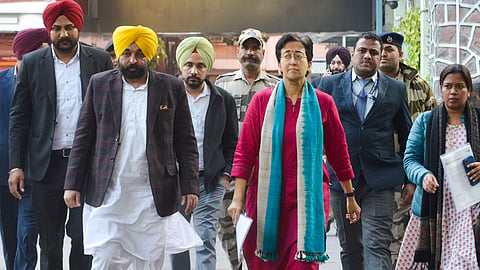 Punjab CM Bhagwant Mann, Delhi CM Atishi and other members of an AAP delegation come out after meeting with Chief Election Commission, in New Delhi, Tuesday.