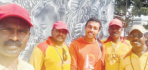 Christos Joshy along with Jeff and Shajan (immediate left and right) at Cherai beach