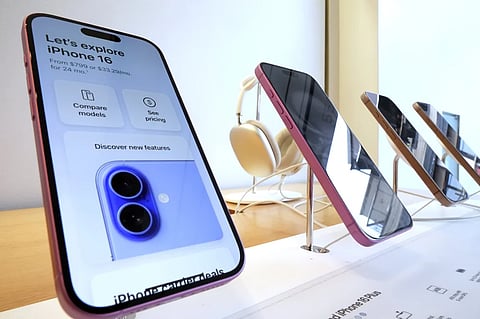 A display of iPhones in an Apple store.