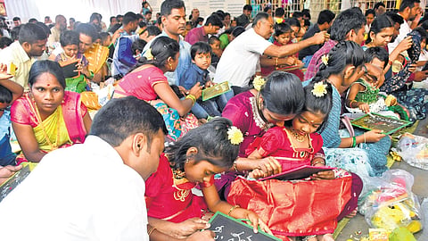 Aksharabhyasam at a Saraswathi temple in Secunderabad on the occasion of Vasantha Panchami