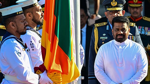 Sri Lanka's President Anura Kumara Dissanayake (R) arrives to hoist the national flag during the country's 77th Independence Day celebrations at the Independence Square in Colombo on February 4, 2025.