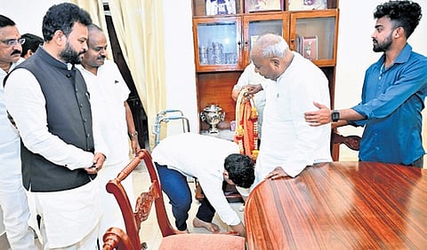 IT Minister N Lokesh taking blessings of former PM HD Deve Gowda