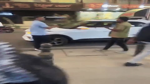 Former head coach was visibly upset over scratches and possibly dents on his vehicle.