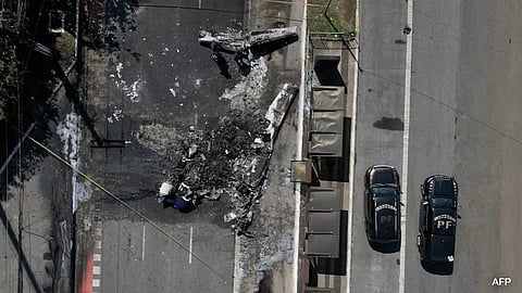 The aircraft hit a bus and exploded, firefighter chief Ronaldo Melo told journalists