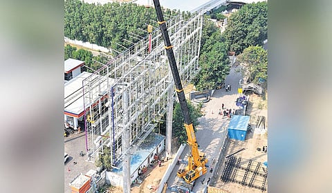 HYDRAA pulls down a unipole erected without permission in Hyderabad.