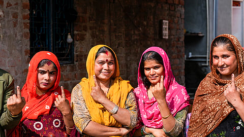 Women in Delhi after casting their vote
