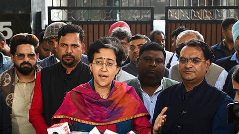 Former Delhi chief minister Atishi with AAP winning candidates addresses the media after a meeting with party convenor Arvind Kejriwal, outside his residence in New Delhi, Sunday, Feb. 9, 2025.