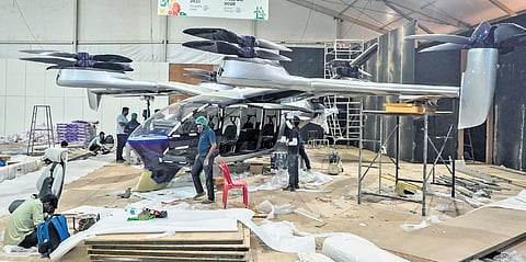 Taxi Shunya, an electric vertical takeoff and landing (eVTOL) aircraft displayed at the Global Investors’ Meet 2025 at Bangalore Palace Grounds